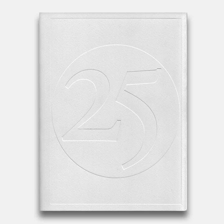 Notebook with the number "25" on the cover.