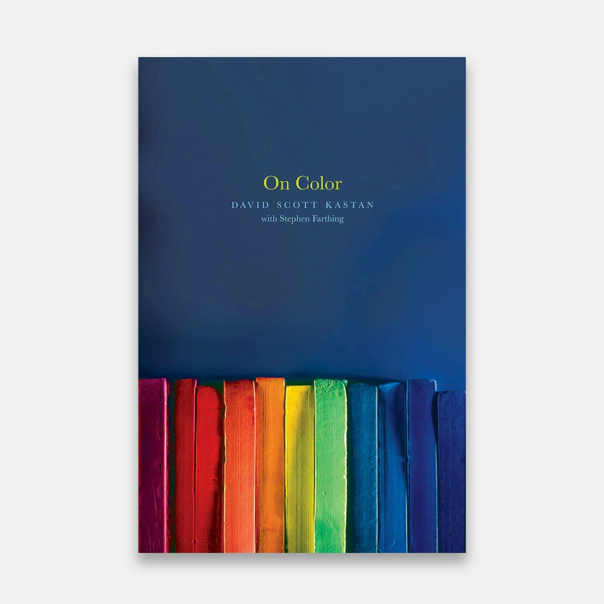 Book cover with a dark blue background and a rainbow of pastels
