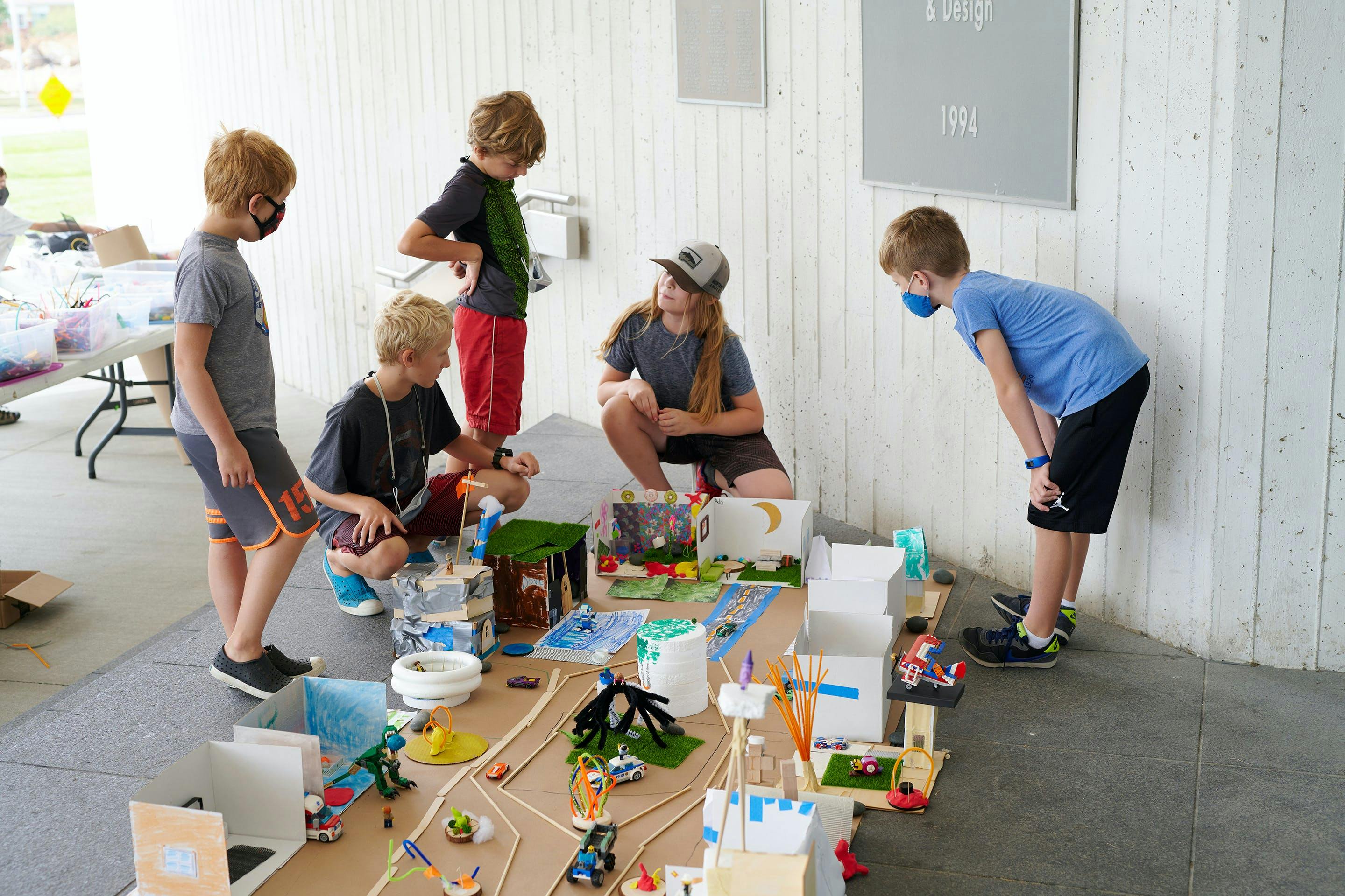Children working together on an art activity at Kemper Museum